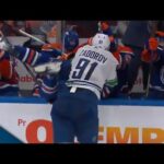 Canucks' Nikita Zadorov Absolutely Levels Evander Kane Into Oilers Bench