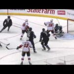 Magical Puck - Jonathan Quick makes the intial save on Jarome Iginla's slapper.