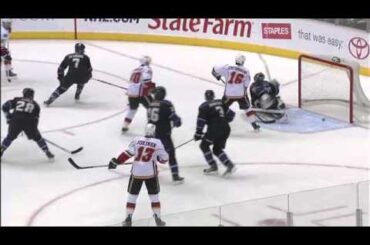 Magical Puck - Jonathan Quick makes the intial save on Jarome Iginla's slapper.