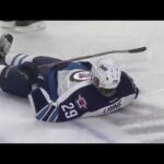 Patrick Laine gets hit by Jake McCabe