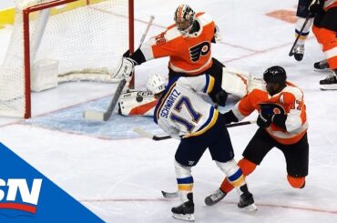 Flyers' Carter Hart Slides Over To Rob Blues' Jaden Schwartz