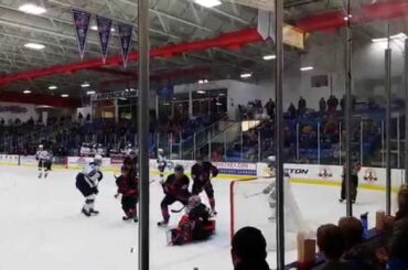 Youngstown Phantoms #31 Colin DeAugustine with a Glove save on USA #22 Kieffer Bellows