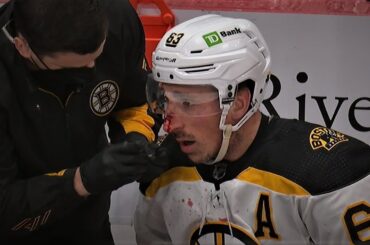 Brad Marchand Catches This Nic Dowd Stick Up High