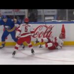 Riley Stillman throws a big hit on Jesperi Kotkaniemi