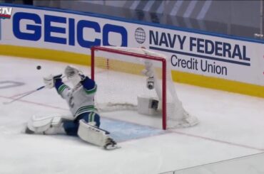 Markstrom dives back into the crease for desperation save