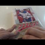 Jay opens a box of Upper Deck MVP hockey 2024-25