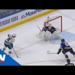 Jake Virtanen Rips Puck Under The Bar Past Jake Allen From Goal Line