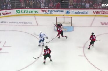 John Tavares scores a goal against the New Jersey Devils