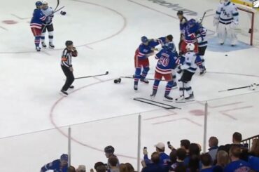 Multiple Fights Erupt After K'Andre Miller Scores Off Glass