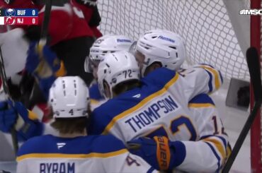 Tage Thompson scores a goal against the New Jersey Devils