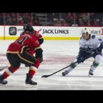 Boeser weaves through Flames beats Gillies with wrist shot