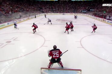 Dylan Strome scores a goal against the New Jersey Devils