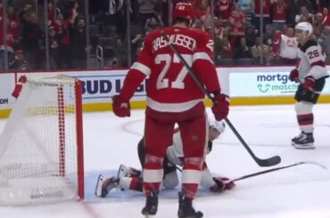 Michael Rasmussen Celebrates Standing Over Jack Hughes